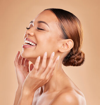 Smile, beauty and a woman with hands on face for skin care glow and shine in studio on brown background. Aesthetic female model laugh and satisfied with spa facial, dermatology cosmetic and wellness