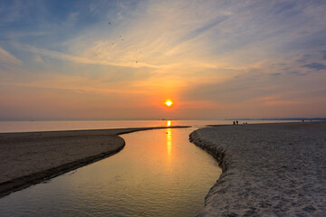 Beach of the Baltic Sea in Gdansk at sunrise. Poland