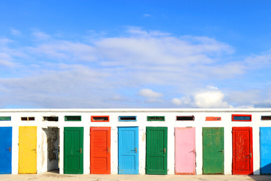 Colorful changing cabins, landmark on beach Jadrija, in Sibenik, Croatia.