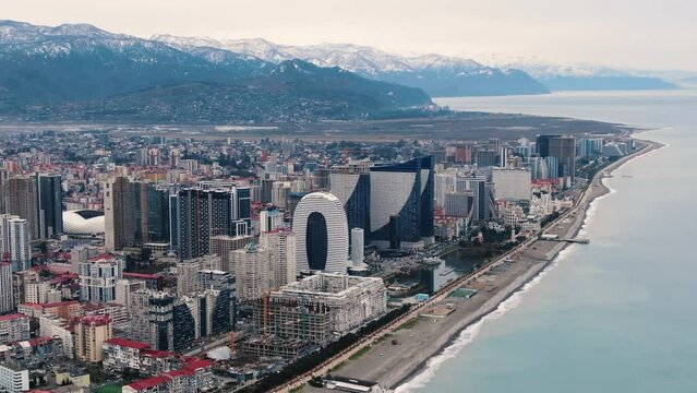 Aerial view of Batumi coastline with tall skyscrapers hotels
