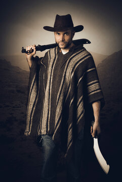 portrait of man with leather hat and machete