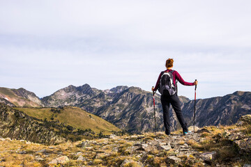 Young hiker girl enjoying in Camporrells, Pyrenees, France