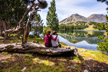 Young hiker couple enjoying in Camporrells, Pyrenees, France