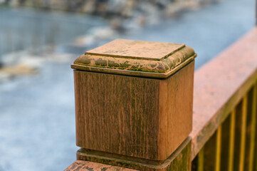 Wooden railing in the park.