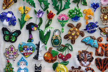 Beautiful diverse and colorful handmade brooches