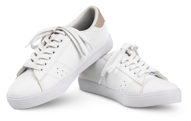 White leather sneakers with shoelaces bows isolated on transparent background with shadow. Full Depth of Field
