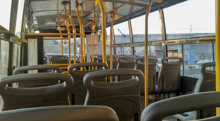 The interior of the local bus in Bangalore, empty. Passenger transportation. Public transport. © vamshi
