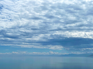 Fototapeta na wymiar Beautiful view of Lake Baikal with light haze