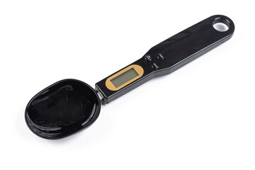 Black spoon scale isolated above white background
