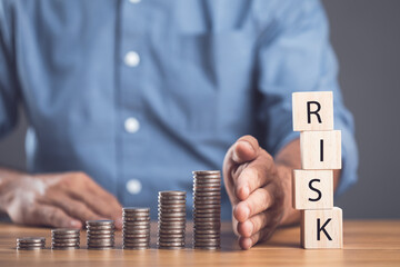 Protecting money from future risk. Preventing money problem situation. Man using hand to partition...