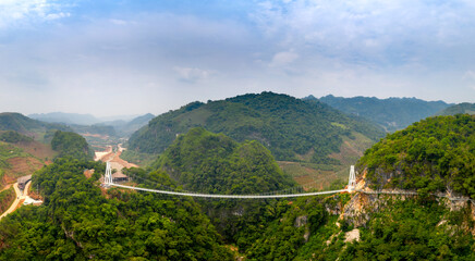 Fototapeta na wymiar See Bach Long glass bridge in Moc Chau district, Son La province, Vietnam with a total length of 632 m, this is the longest pedestrian glass bridge in the world
