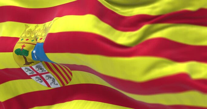 Seamless loop in slow motion of the Aragon flag waving