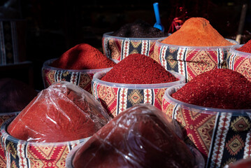 Organic red pepper powders in a spice shop, close up, outdoor photography in the city of Gaziantep of Turkey country