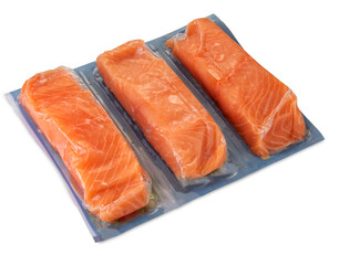 Salmon slices in vacuum packed sealed for sous vide cooking isolated on white, clipping path...