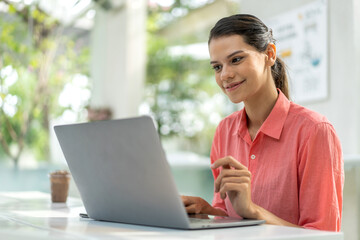 Portrait of creative woman use laptop work digital online marketing internet advertising and sales business technology concept, online marketing, E-business, Ecommerce, Business online at cafe