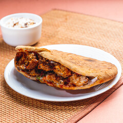 peta bread filled with spicy cheese and tofu