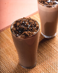 cold coffee with chocolate powder on top 
