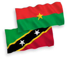 Flags of Federation of Saint Christopher and Nevis and Burkina Faso on a white background
