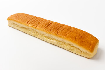 Bread sticks with butter on a white background