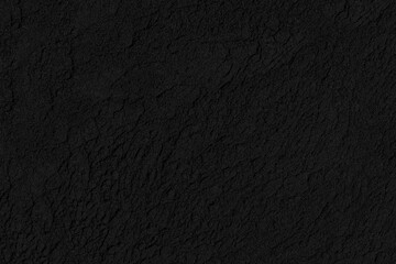Cement wall panorama painted black with rough lines texture and seamless surface. Background...