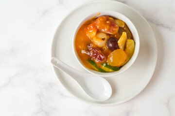 rujak aceh is Indonesian mixed fruit salad made from mixed fruit anf mango kweni sauce and chili