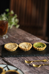 pie susu, milk pie, chocolate and matcha in mini size on the table