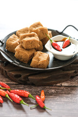 tahu sumedang or fried tofu with chili
