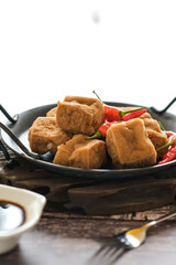 tahu sumedang or fried tofu with chili
