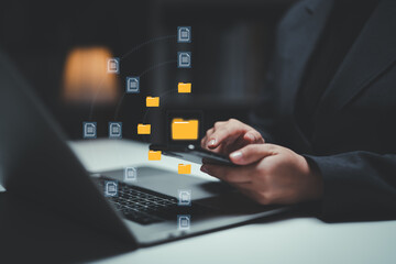 Document management system concept, business man holding folder and document icon software, searching and managing files online document database, for efficient archiving and company data.
