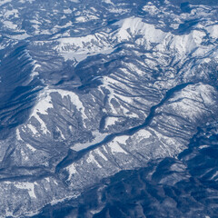 ice on the mountains from plane