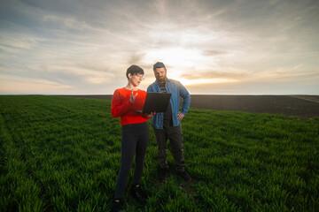 A woman agronomist and a young farmer