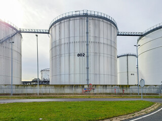 Tanks for oil and petro storage at the Pernis harbor in the port of Rotterdam