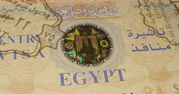 Macro close up of passport stamps and Egyptian visa. 