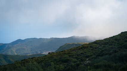 Fototapeta na wymiar Madeira Mountains Clouds Fog Pico