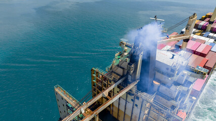 Smoke exhaust gas emissions from cargo lagre ship container ship,Marine diesel engine exhaust gas...