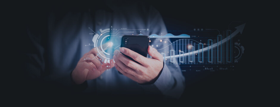 Businessman using smartphone with big data and analysis system concept