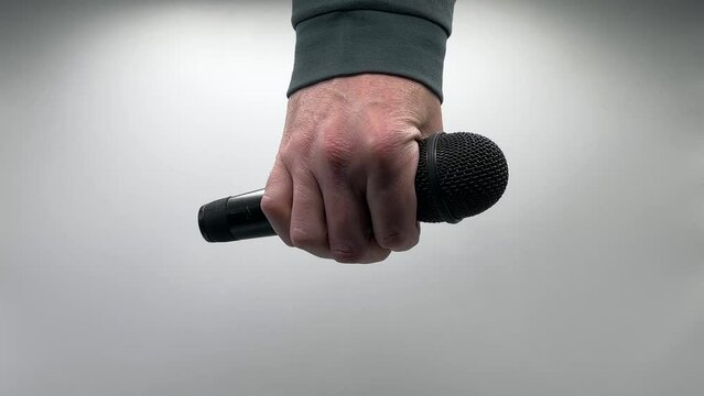 Drop the Mic on Slow Motion - Male Hand Black Mic
