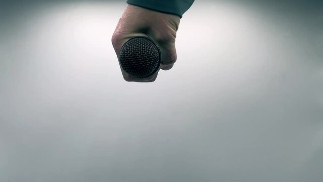 Drop the Mic on Slow Motion - Male Hand Black Mic