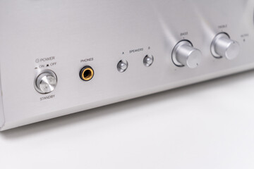 closeup view on vintage stereo audio amplifier