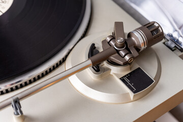 closeup view on vintage vinyl record player with stylus