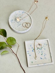 Jesmonite terrazzo stylish decorative trays with golden jewellery 