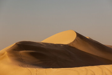 Fototapeta na wymiar Sand dunes in desert in Qatar.