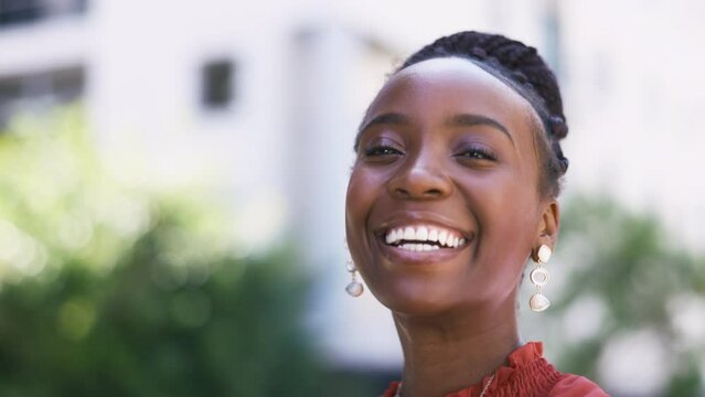Black woman face, relax and closeup of a young person from Nigeria with happiness outdoor. Portrait, happy and smile of African female feeling freedom from holiday in summer with blurred background