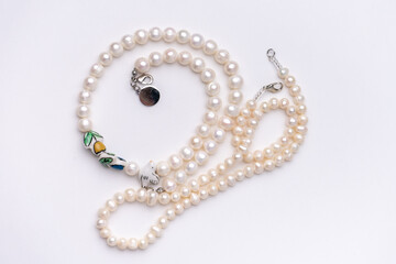 pearls stings on white background