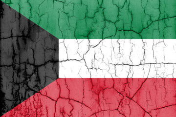 Flag of Kuwait on cracked wall, textured background.