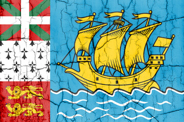 Flag of Saint-Pierre and Miquelon on cracked wall, textured background.