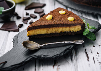 passion fruit chocolate cake on wood