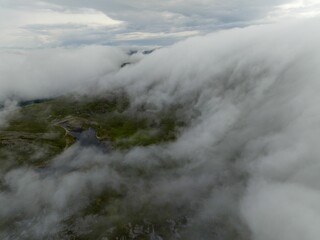 Aerial view of mountains with clouds