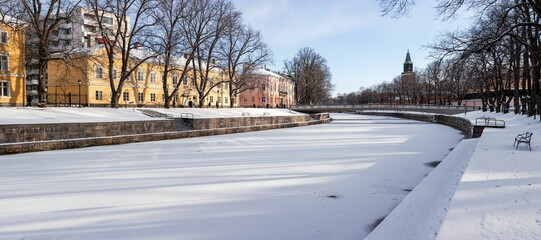 Chilling view of a frozen river in the town of Turku in Finland during winter