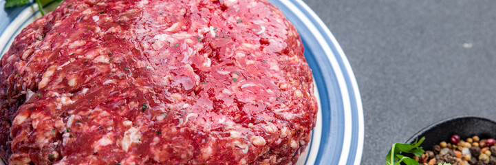 raw beef minced meat ground meat fresh ready to cook meal food snack on the table copy space food background rustic top view